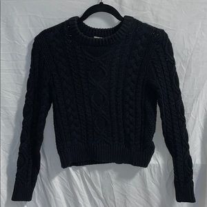 Knitted black sweater